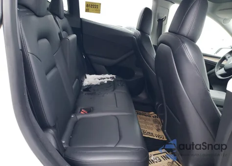 2023 Tesla Model Y z USA, uszkodzony, nr VIN 7SAYGDEE2PF602844